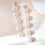 Voyage Pearl Cascade Long Dangler Earrings