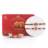 Traditional And Divine Motifs Pack Of 2 Thread Rakhis With Chana Badam Barfi 250 Gms