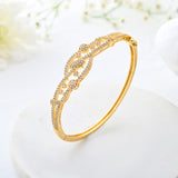 Sparkling Elegance Royal Crest Gold American Diamond Bracelet