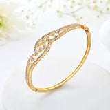 Sparkling Elegance Aurora Twine Gold American Diamond Bracelet