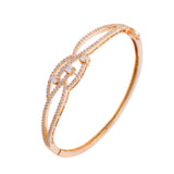 Sparkling Elegance Twilight Interlace Gold American Diamond Bracelet