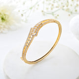 Sparkling Elegance Luminous Knot Gold American Diamond Bracelet