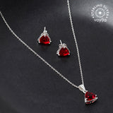 Sterling Silver Pendant Set Glittering with Red Stones