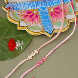 Set Of 2 Floral Enameled Rakhi With Roli Chaawal Pack