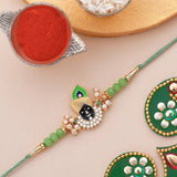 Deity Inspired Green Beads embedded Lord Krishna Rakhi
