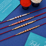 Set of 4 
Pearl Beads Embellished Flamboyant Rakhi