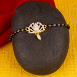 Shimmering Floret CZ Golden Round Brass Black Beaded Bracelet